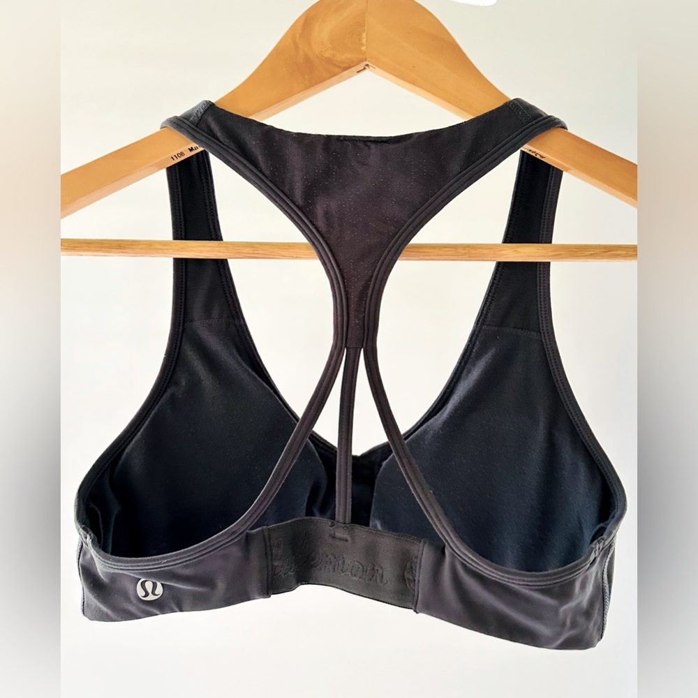 Lululemon grey strappy racerback sports bra. Size 8 A/B cup Light support. NWOT.